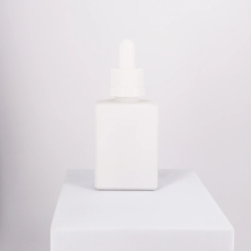 30ml Rectangle Glass Tincture Bottle with Bamboo Dropper Cap | CBD Packaging Wholesale